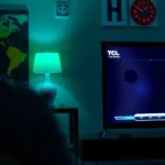 Comparison of TCL and Hisense TVs showcasing Auto Low Latency Mode features.