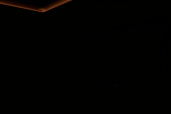 Comparison of Dark Room OLED and QLED panels showcasing image quality differences.